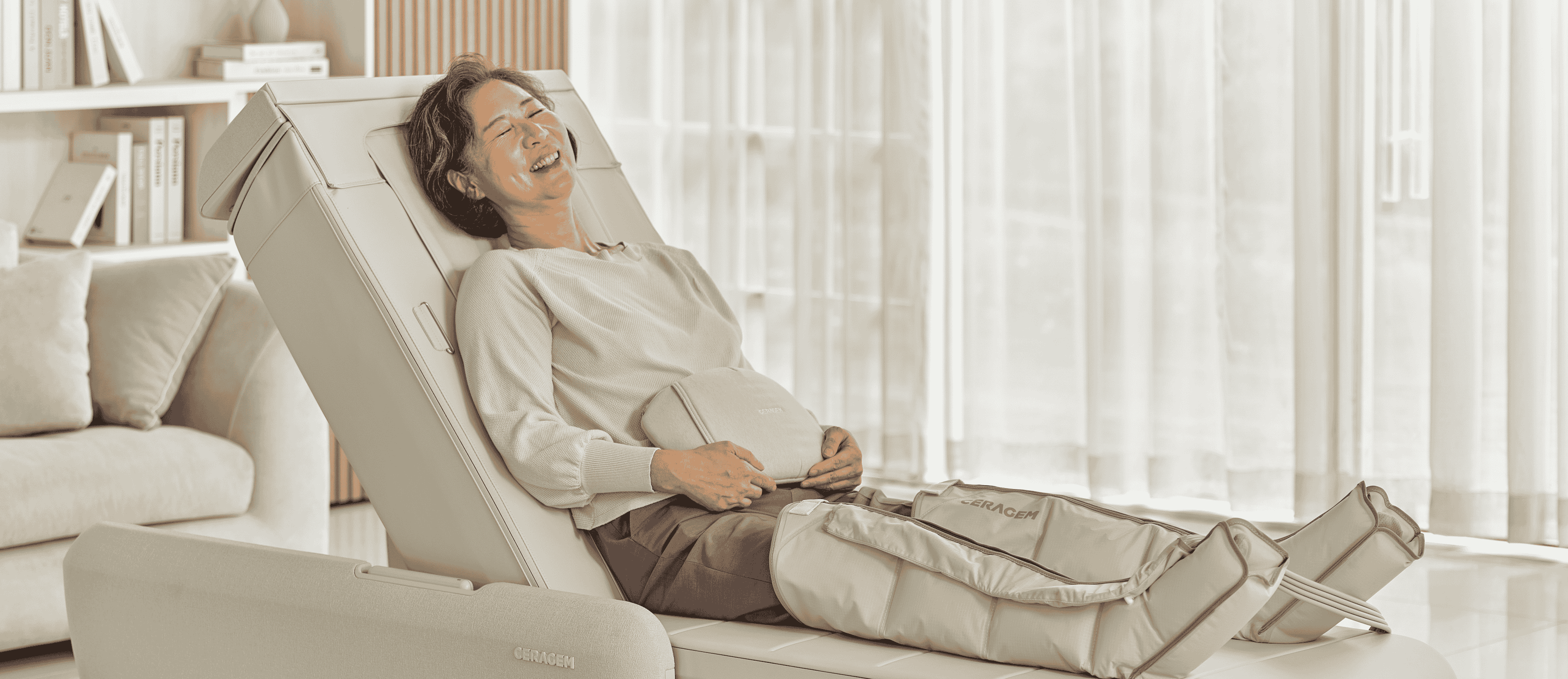 Person relaxing on Ceragem V9 spine therapy chair at home
